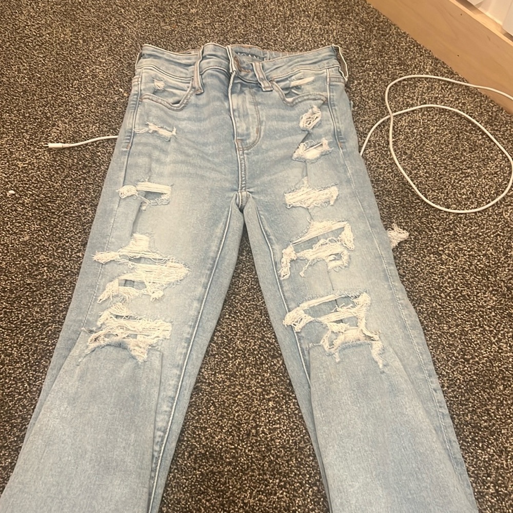 Light blue ripped skinny jeans